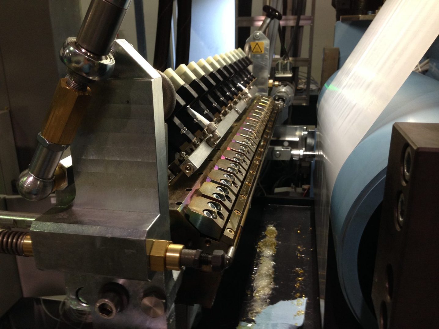 IMC hot melt coating station
