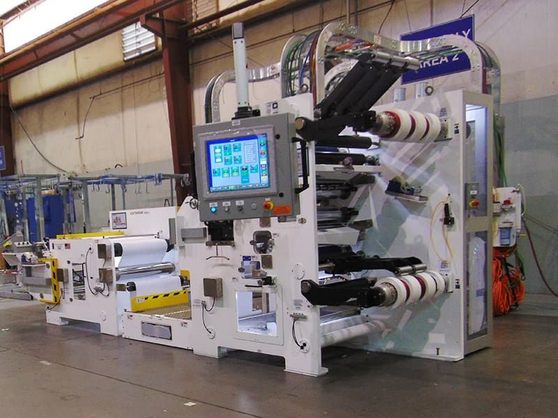 IMC production slitter rewinder running finished rolls