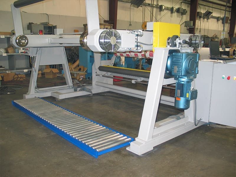 IMC unwind stand with roll conveyor