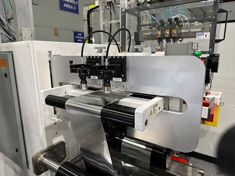 Web inspection station on an IMC converting line